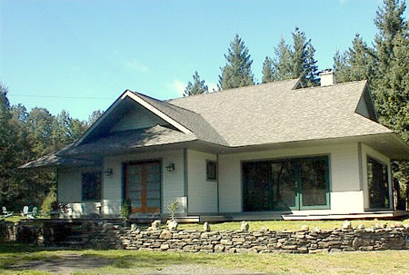 Elegant Custom Japanese Style Home privately sited on 5+ acres, adjacent to state land and bordered by the Little Westkill stream.  This 3 bedroom, 2 bath contemporary, with open floor plan, cathedral ceilings, radiant heat with bamboo and tile flooring is a rare gem.  Separate pole barn with electricity.    The attention to detail is phenomenal!
