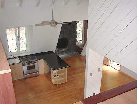 Features include: brand new gourmet kitchen with granite countertops, Bosch and Kitchen aid stainless steel appliances, new bath with Parisian tile, Jacuzzi, mahogany vanity, sea glass tile and sink; unique round stone fireplace, glossy hardwood floors,