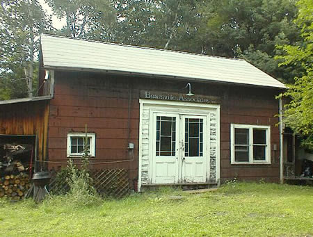 sunny LR/kitchen area  overlooking backyard field, plus a partially-renovated classic barn 