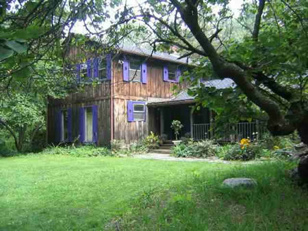 Historic site of Watson Hollow Inn: A Beautiful setting for this four bedroom three bath home featuring wide board floors, beamed and wainscoted ceiling, custom kitchen, amazing fireplace, vaulted living room, office, pocket doors. Barn has a two bedroom guest house w/ wood floors and beamed ceiling, beautiful artists studio & add. studio space. Broker has interest.