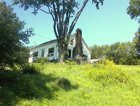 Set on three open acres in ski country, this excellent condition, beautifully restored 100+ year old farmhouse boasts 1900 sq ft, 4 bedrooms, huge stone fireplace, 4 car garage, jaccuzzi, 2 full baths, and some of the most stunning views around. A short walk to thousands of acres of State land, 2 1/2 hours from NYC, minutes to three ski areas. A real find. Move right in.